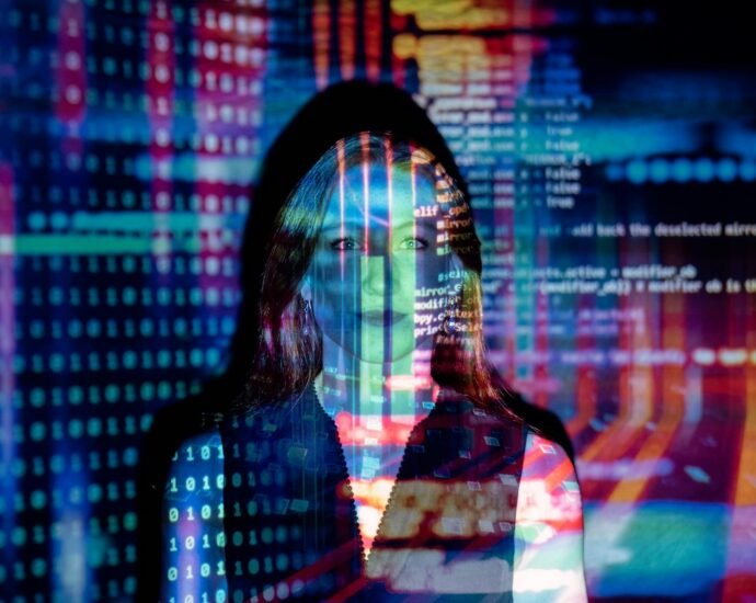 code projected over woman